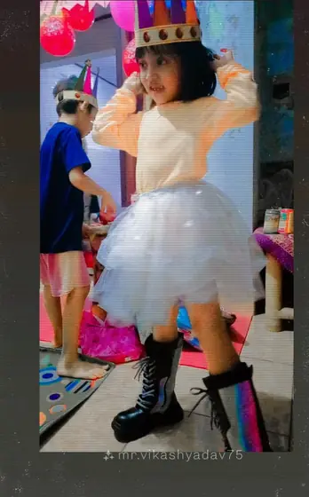 A little girl dressed up for a party